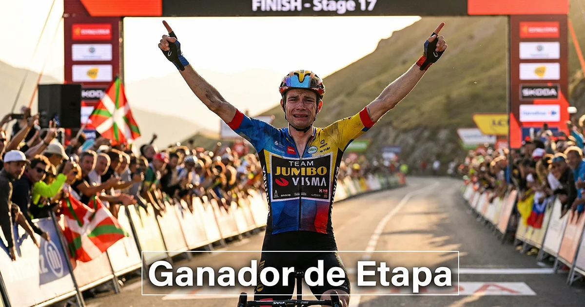 Ciclista profesional cruzando la línea de meta en solitario con los brazos en alto celebrando la victoria de etapa